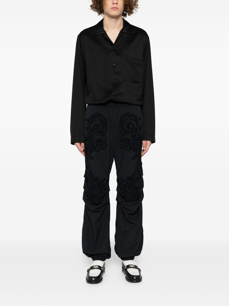 TAAKK sculpture track pants outlook