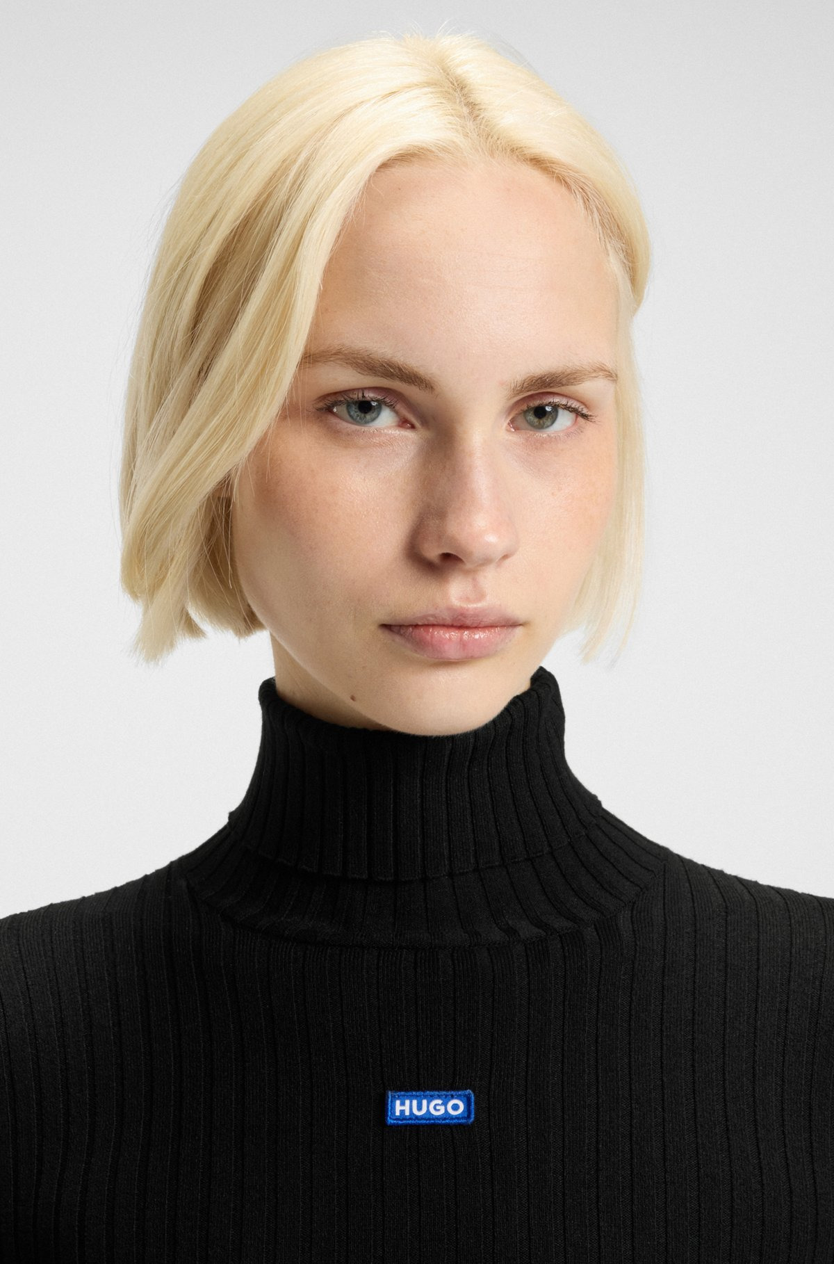 LOGO-BADGE RIB-KNIT SWEATER WITH ASYMMETRIC HEM - 5
