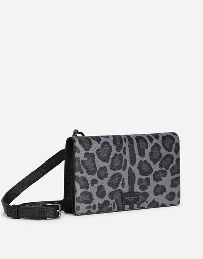 Dolce & Gabbana Dauphine calfskin wallet with shoulder strap and leopard print against a gray background outlook