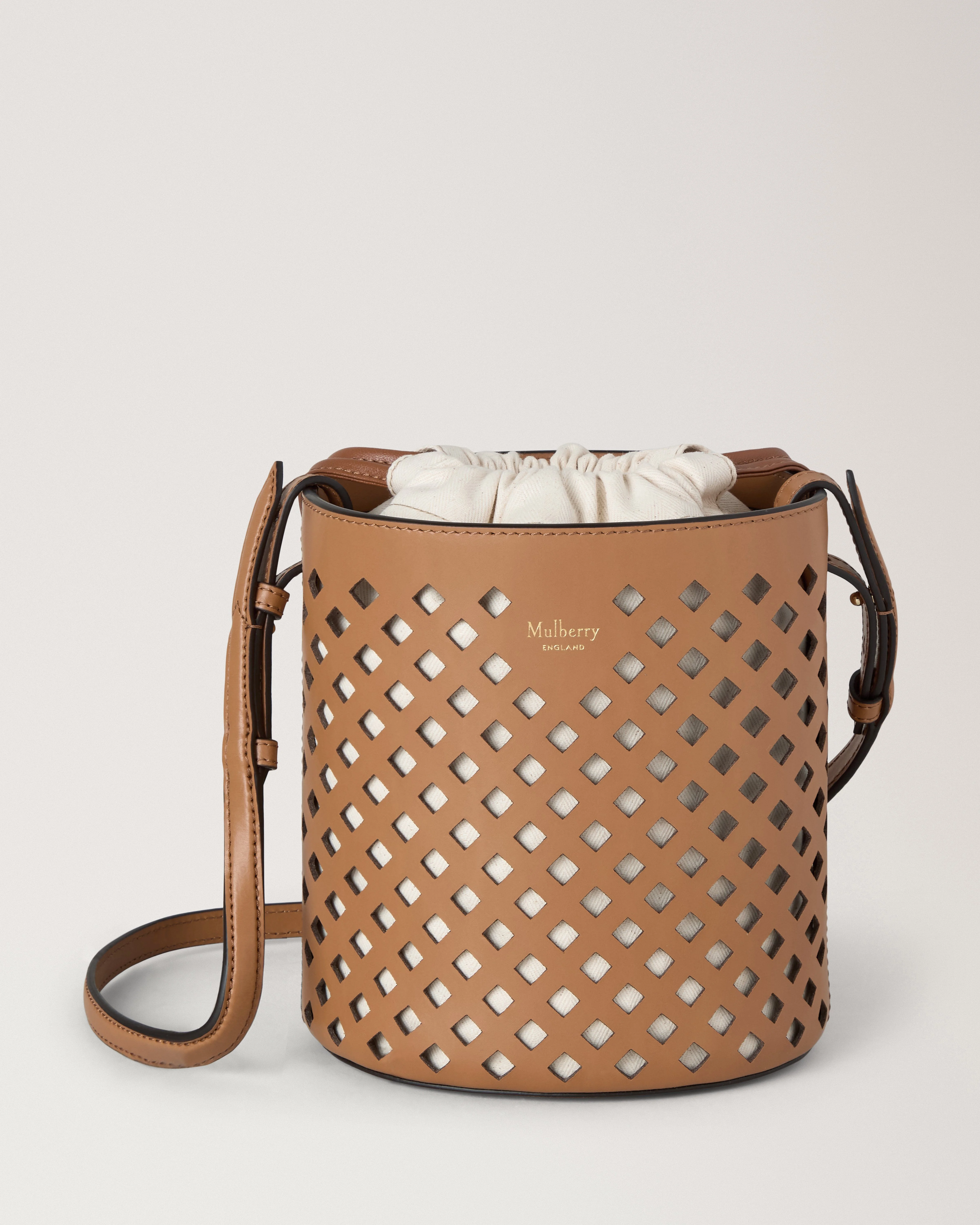 Perforated Bucket
Toffee Perforated Leather - 1