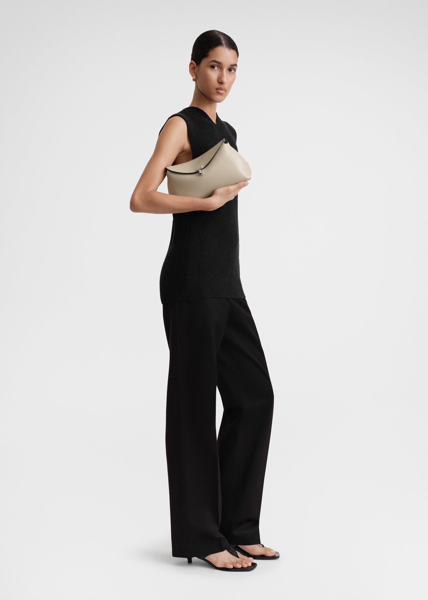 Totême T-Lock clutch fawn | REVERSIBLE