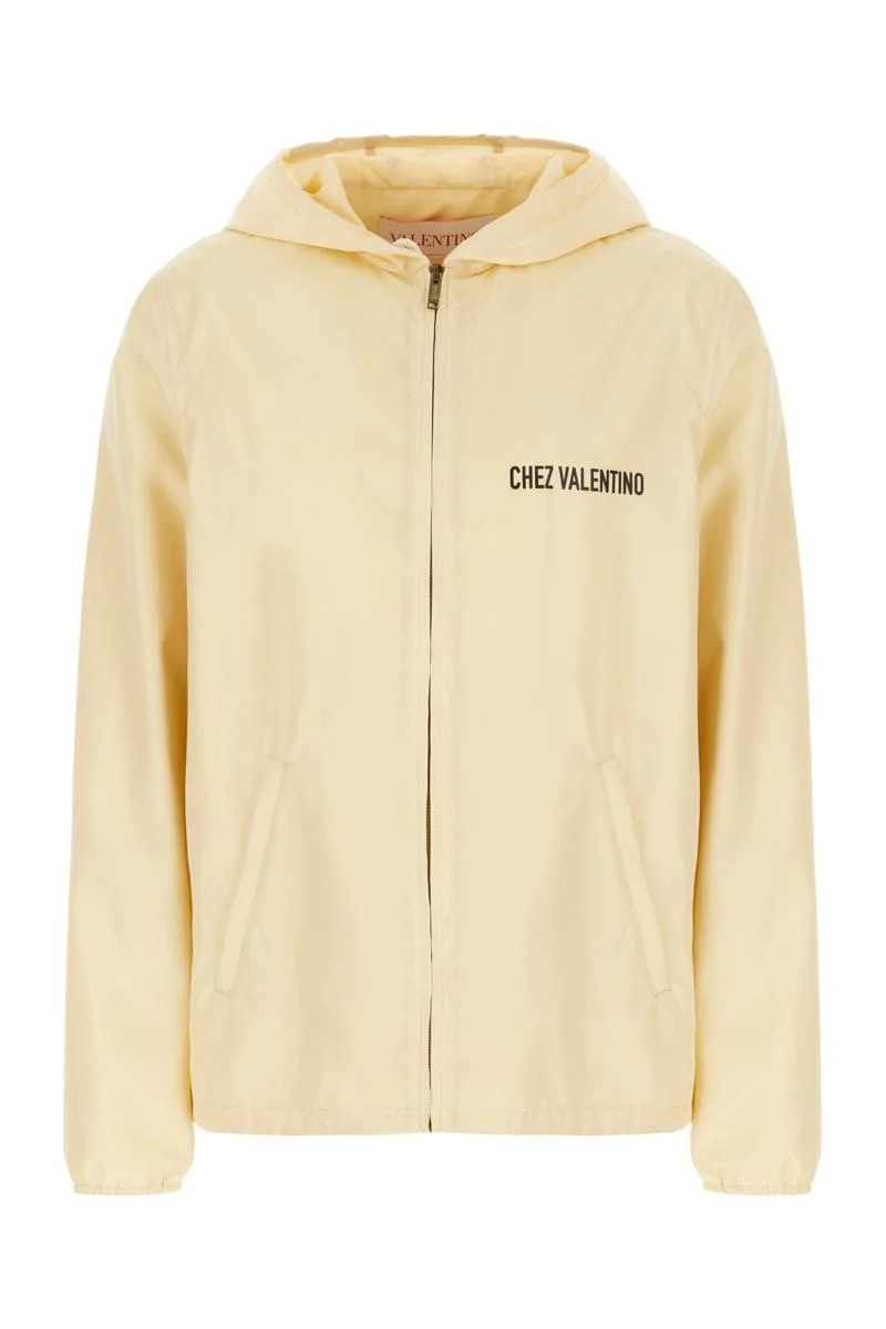 Valentino Garavani beige hooded windbreaker in logoed polyamide - 1