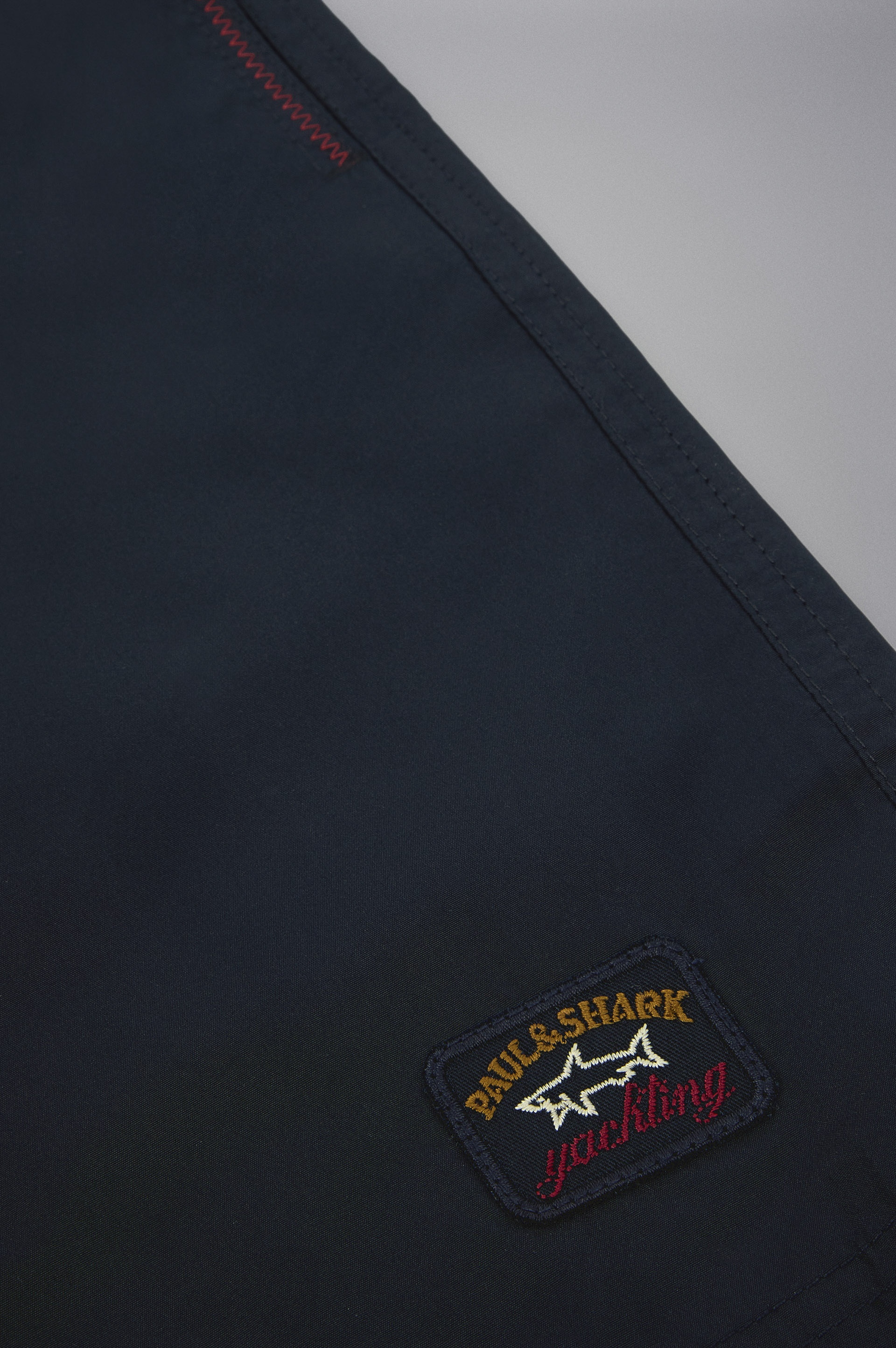 SWIM SHORTS WITH ICONIC BADGE - 5
