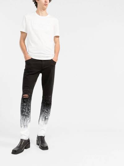 Dolce & Gabbana brushstroke-print slim-fit jeans outlook