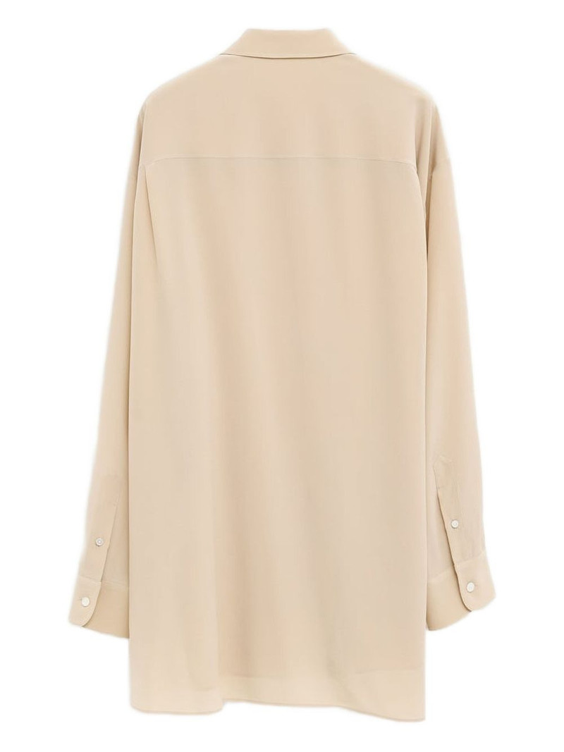 The Row button round hem top outlook