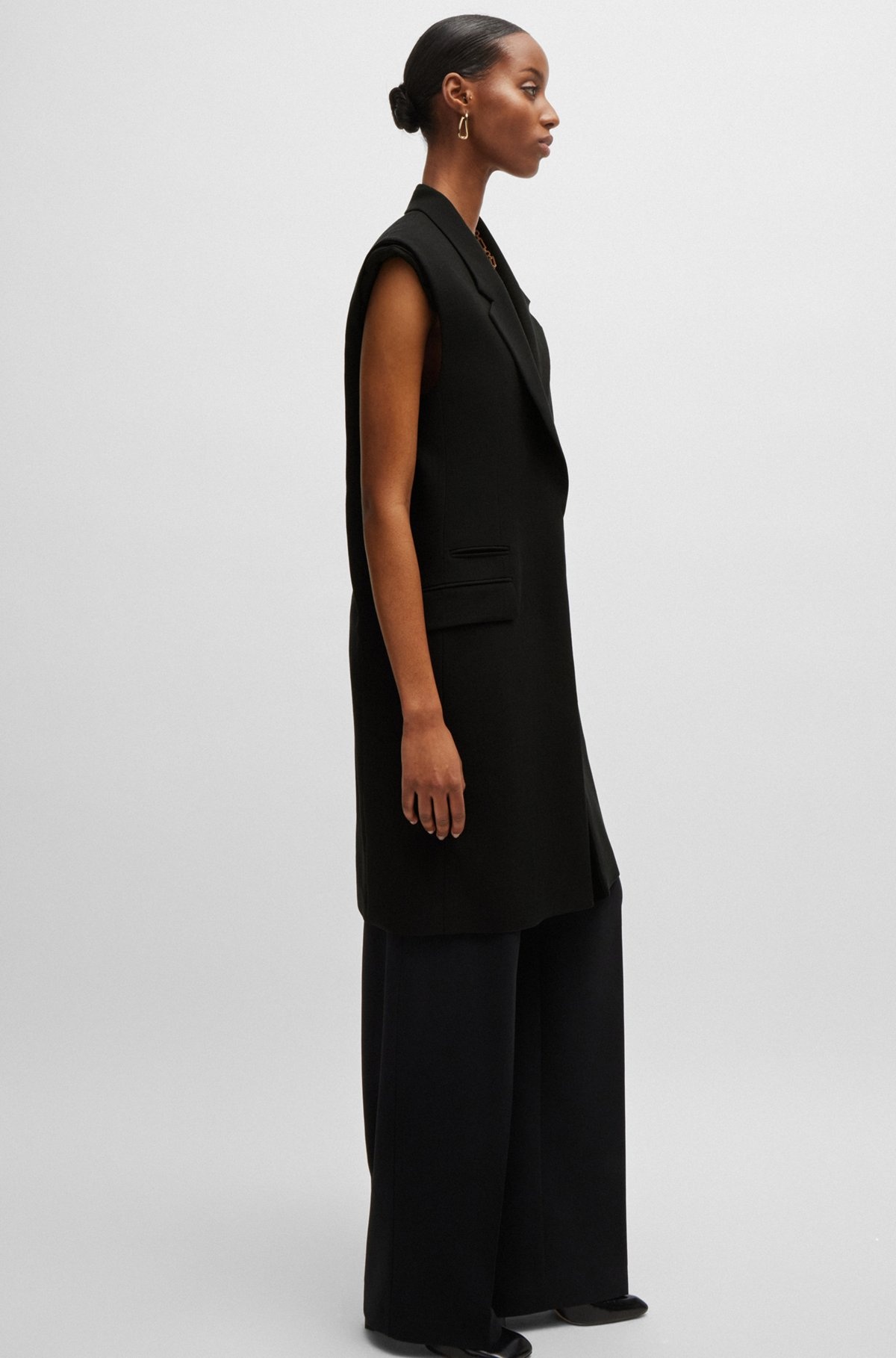 SLEEVELESS JACKET WITH CONCEALED CLOSURE AND SIGNATURE LINING - 6