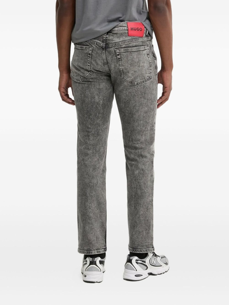 HUGO acid-wash jeans outlook