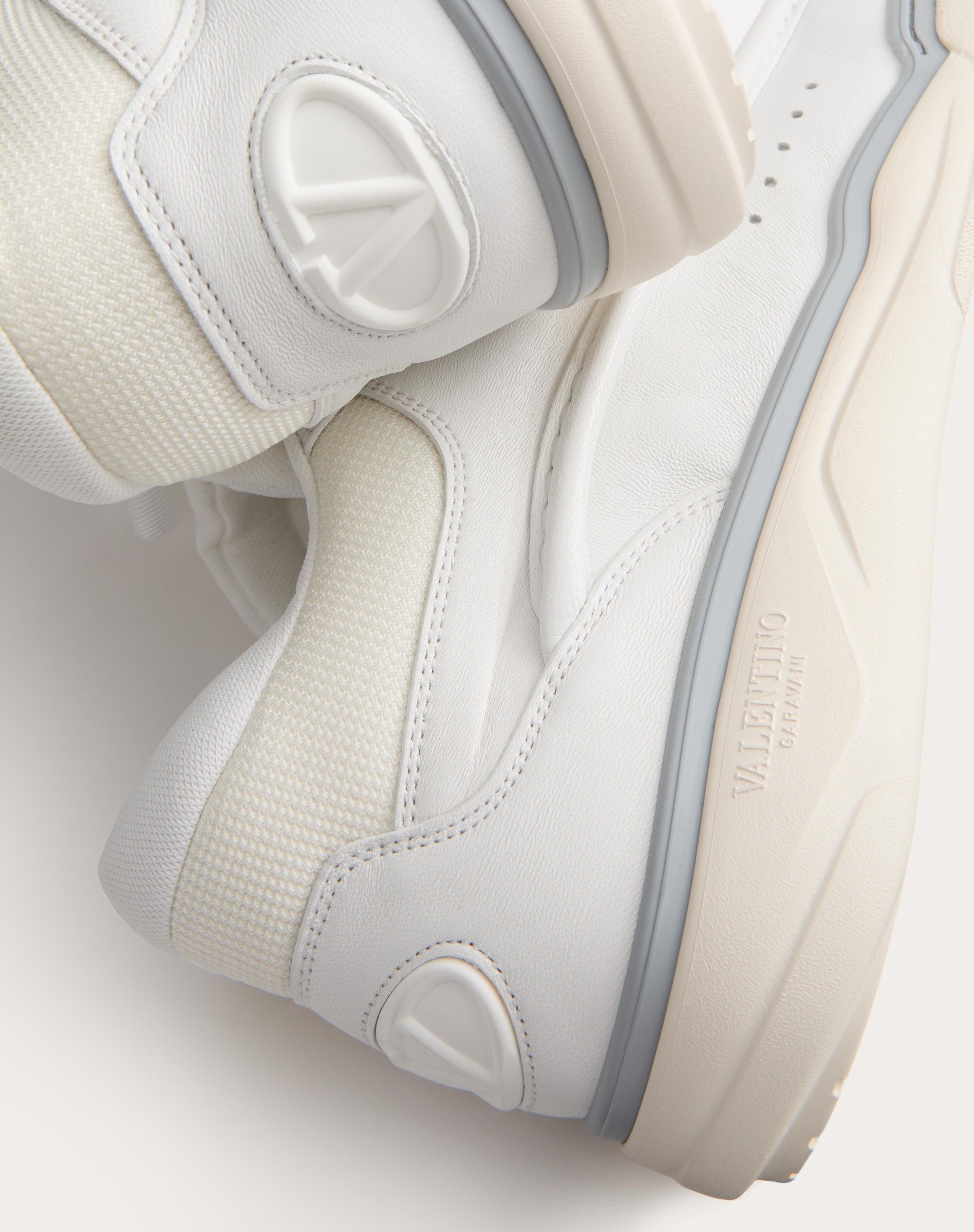 Valentino CALFSKIN LEATHER MID-TOP RUNBOOT SNEAKER | REVERSIBLE
