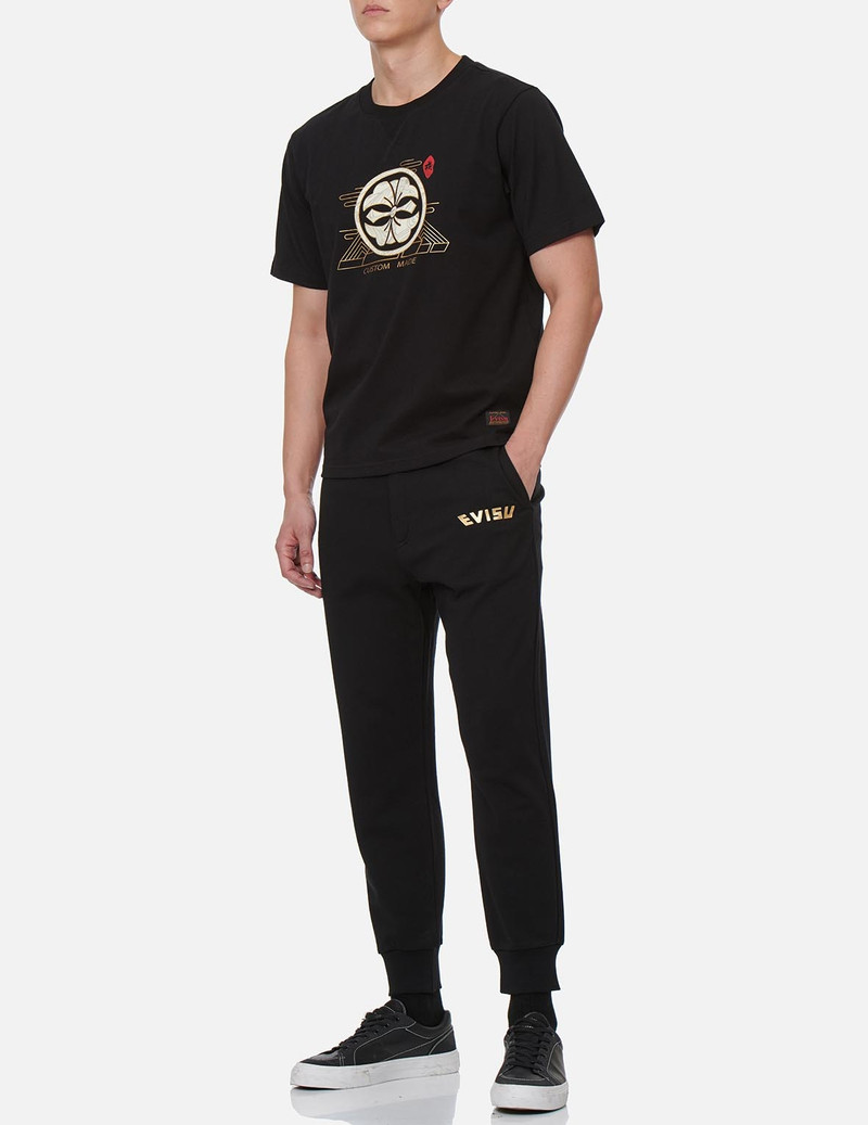 EVISU CALLIGRAPHY DAICOCK FOIL-PRINT SWEATPANTS outlook