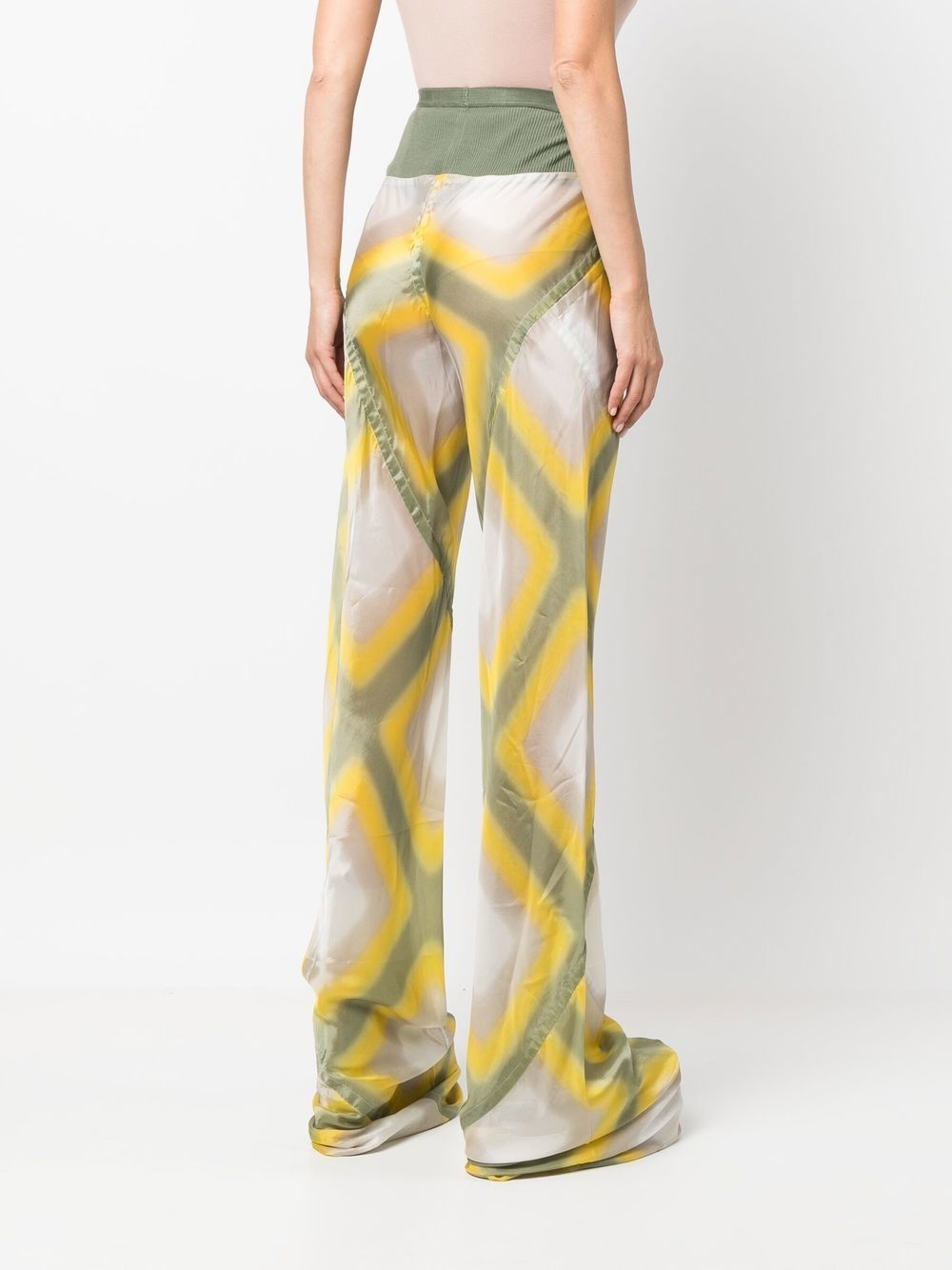 all-over graphic-print trousers - 4