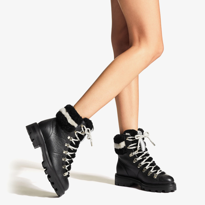 JIMMY CHOO Eshe Flat
Black Grainy Leather Hiking Boots with Natural and Black Shearling Collar outlook