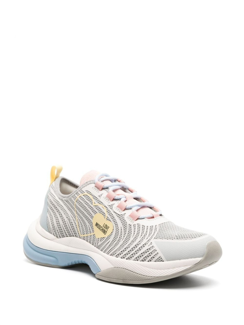 Moschino logo-patch panelled sneakers outlook