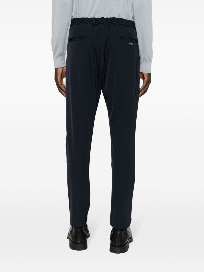 logo-plaque button-fastening tapered trousers 4