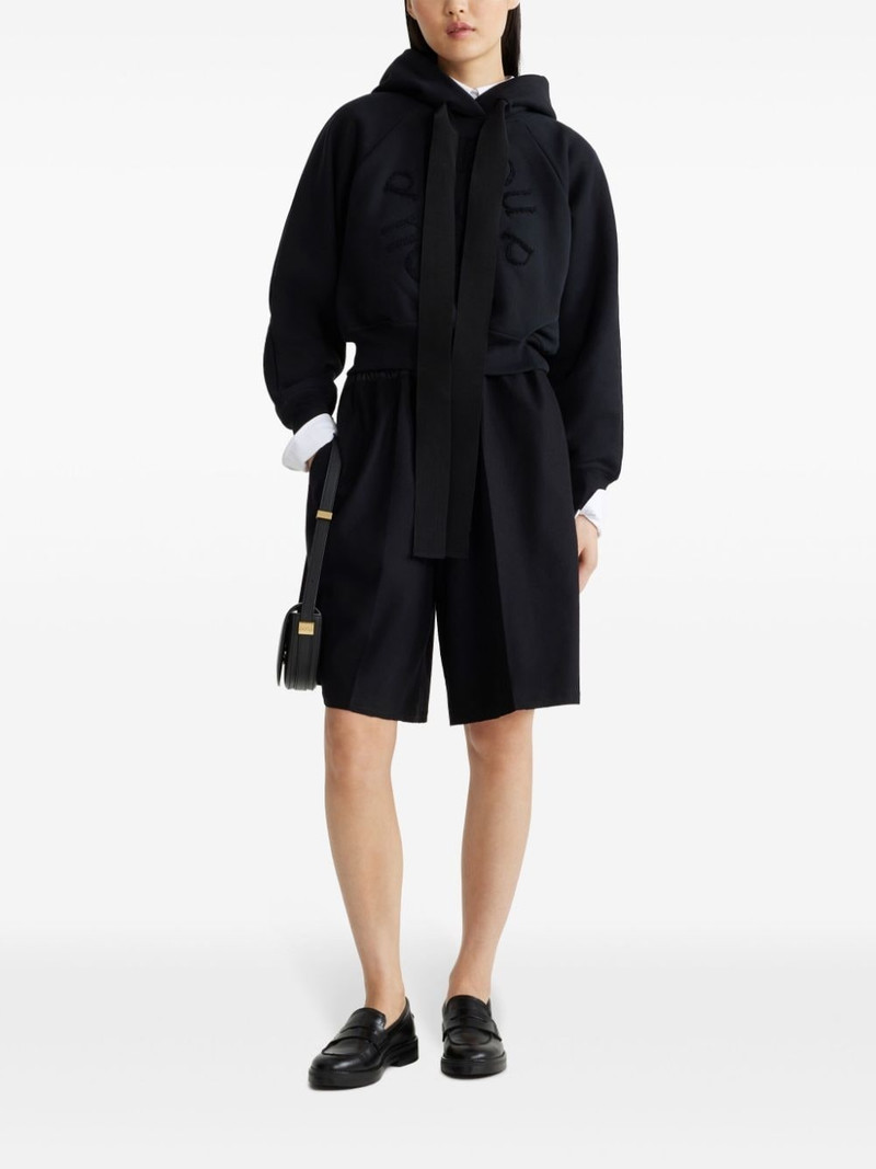 PATOU pressed-crease shorts outlook