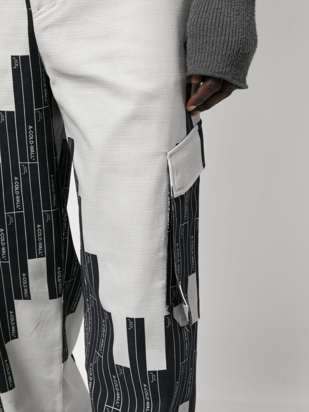 Vector-monogram tapered trousers - 5