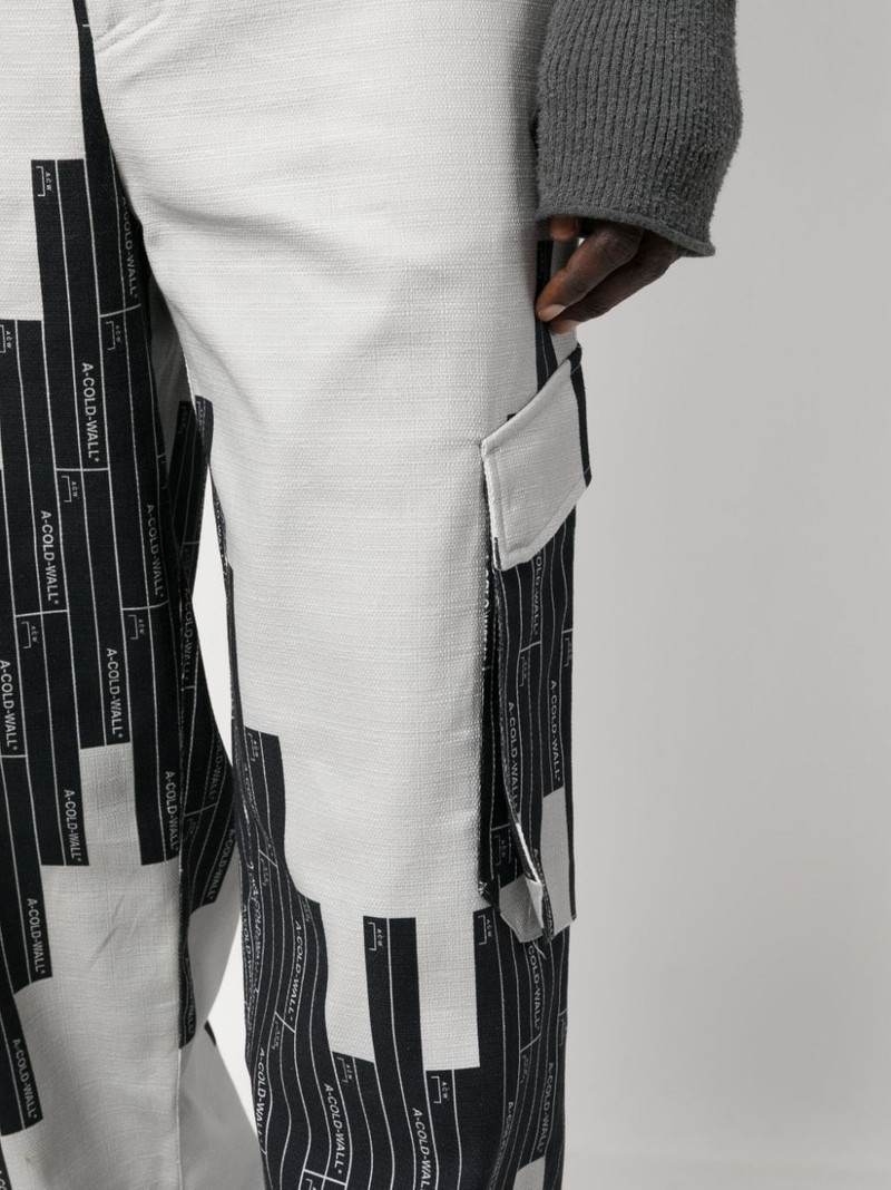 Vector-monogram tapered trousers 5