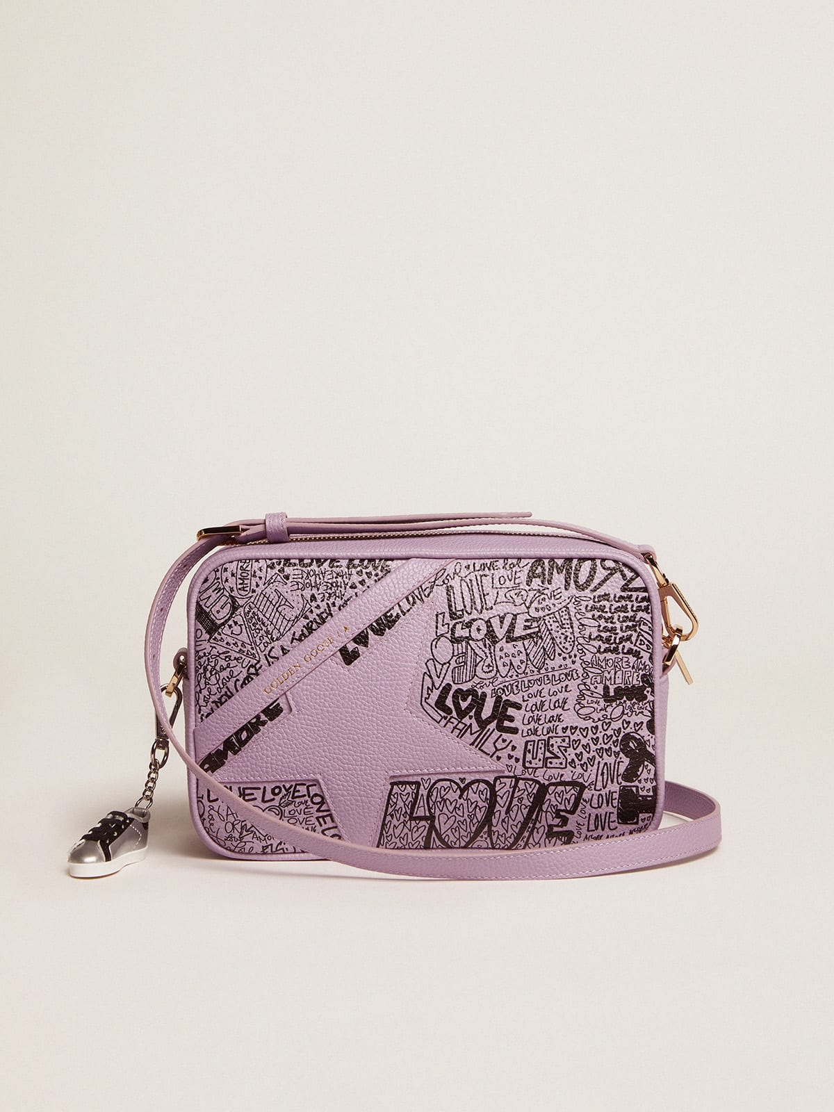 Lilac hammered leather Star Bag with tone-on-tone leather star and black all-over graffiti print - 1