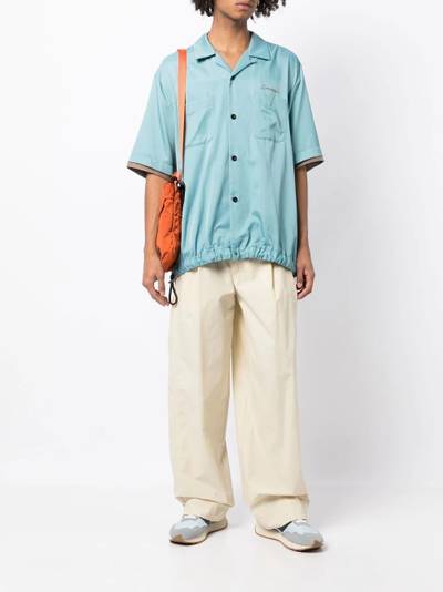 sacai embroidered-logo short-sleeved shirt outlook