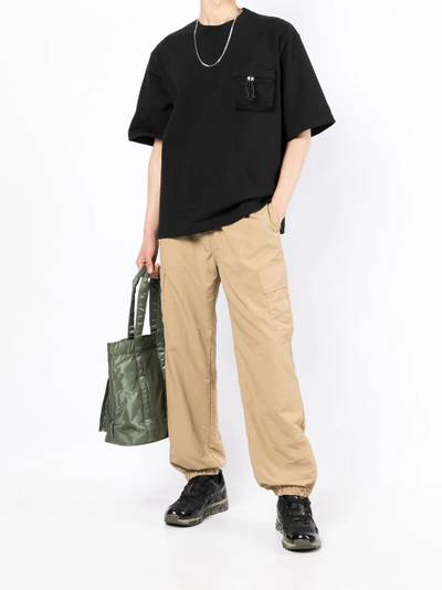 UNDERCOVER x Eastpak patch pocket T-shirt outlook