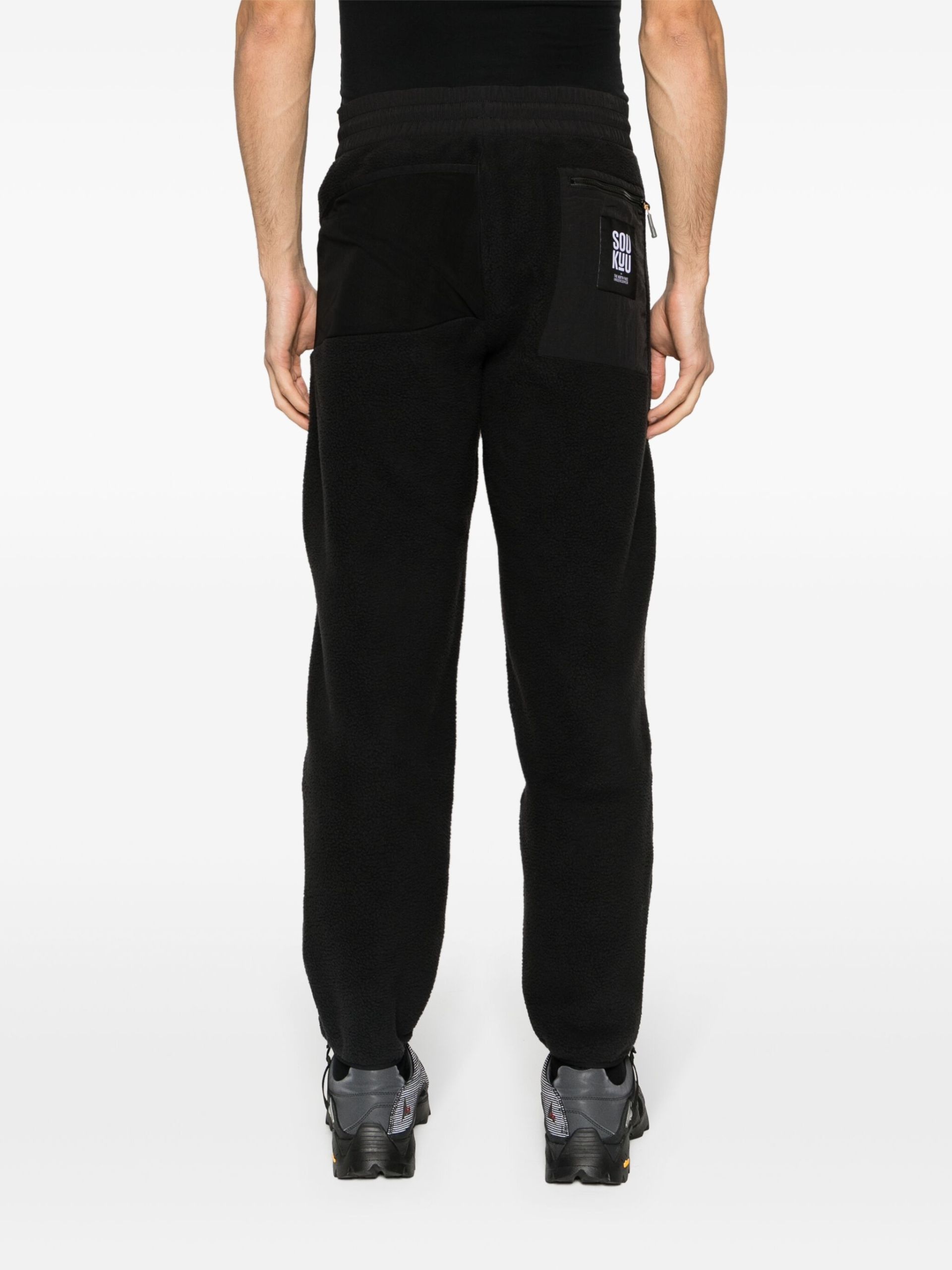 The North Face X Undercover black SOUKUU fleece track pants | brownsfashion  | REVERSIBLE