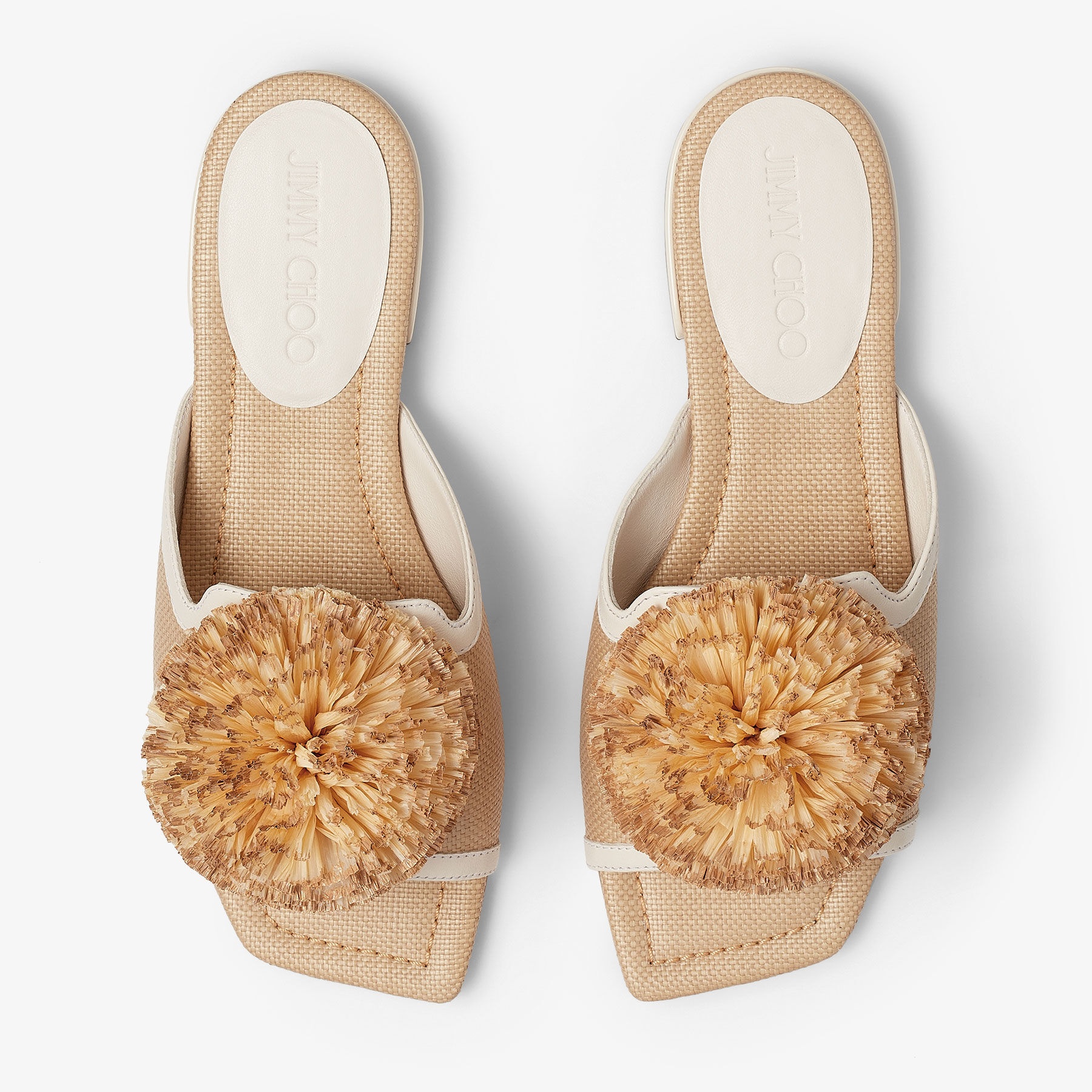 Nako Flat
Natural/Latte Raffia Pom Pom Flats - 4