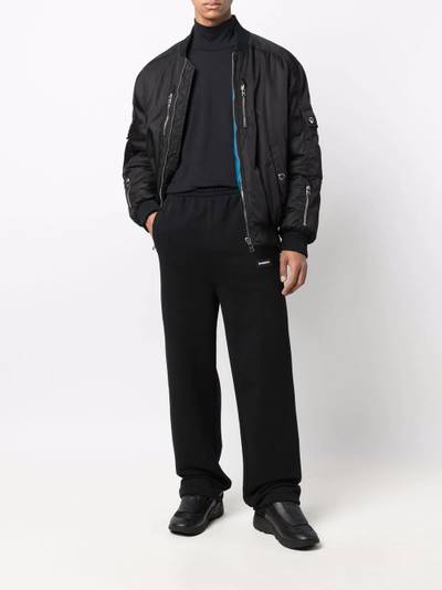 VETEMENTS logo-patch track pants outlook