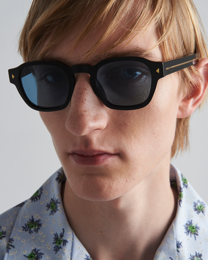Prada Sunglasses with iconic metal plaque outlook