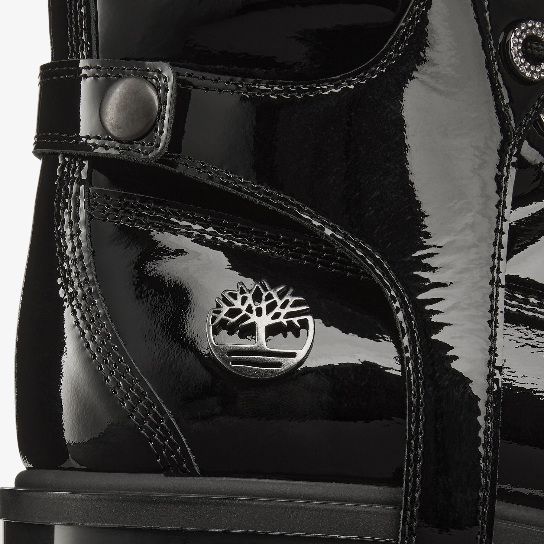 JIMMY CHOO X TIMBERLAND PATENT LEATHER HARNESS BOOT
Black Timberland Patent Knee High Boots with Det - 6