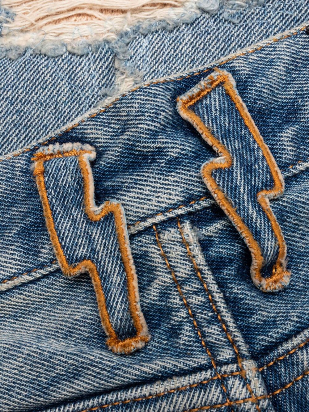 distressed lightning-bolt jeans - 4