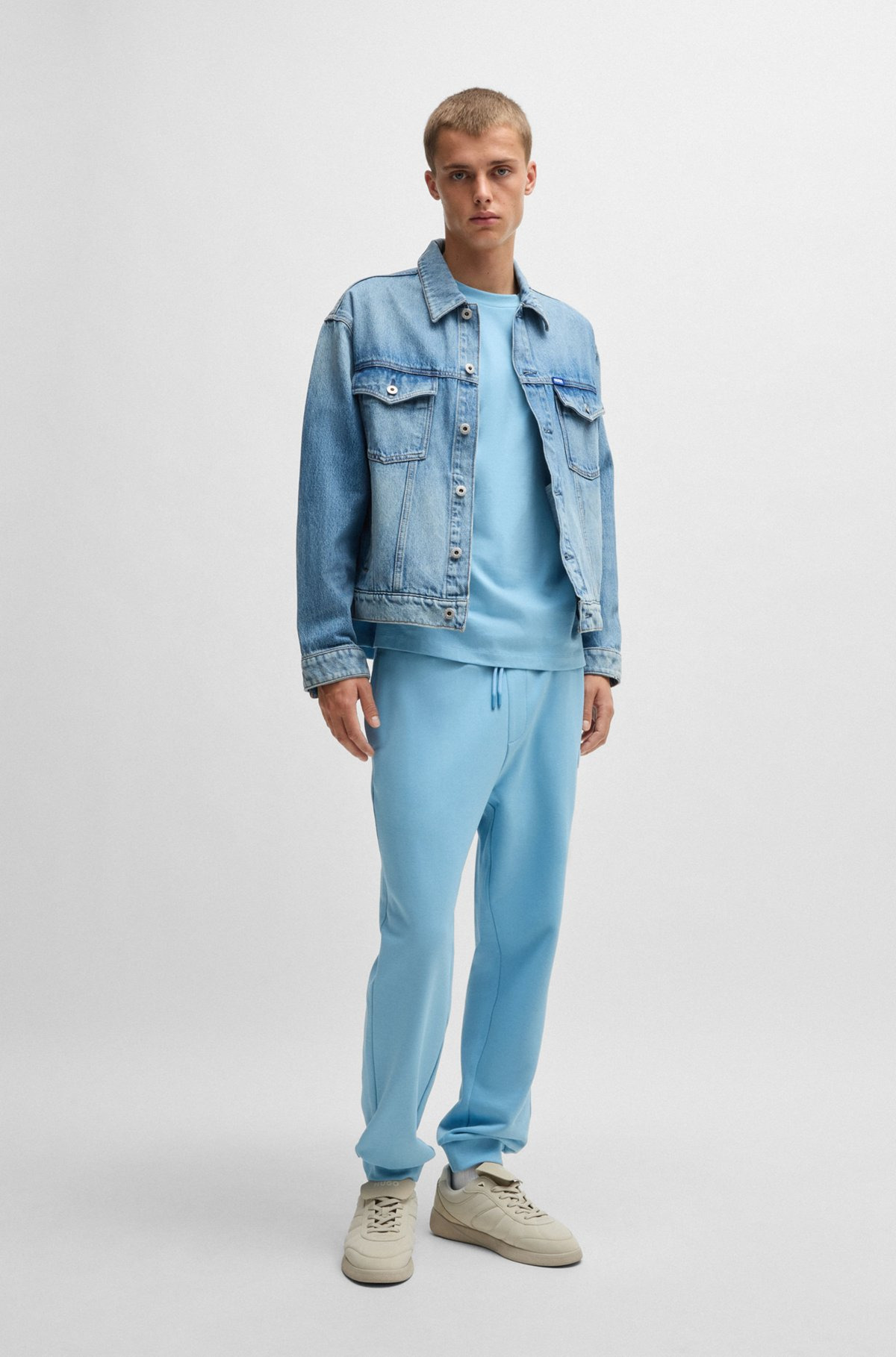 COTTON-TERRY TRACKSUIT BOTTOMS WITH HAPPY HUGO LOGO PATCH - 4