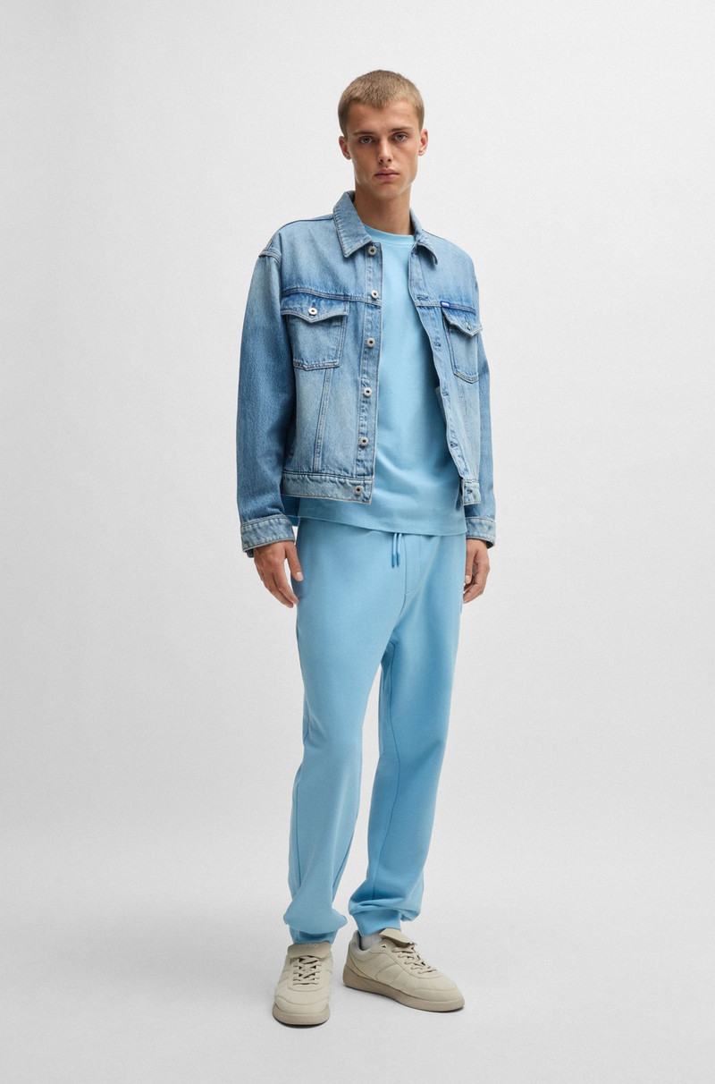 HUGO COTTON-TERRY TRACKSUIT BOTTOMS WITH HAPPY HUGO LOGO PATCH outlook