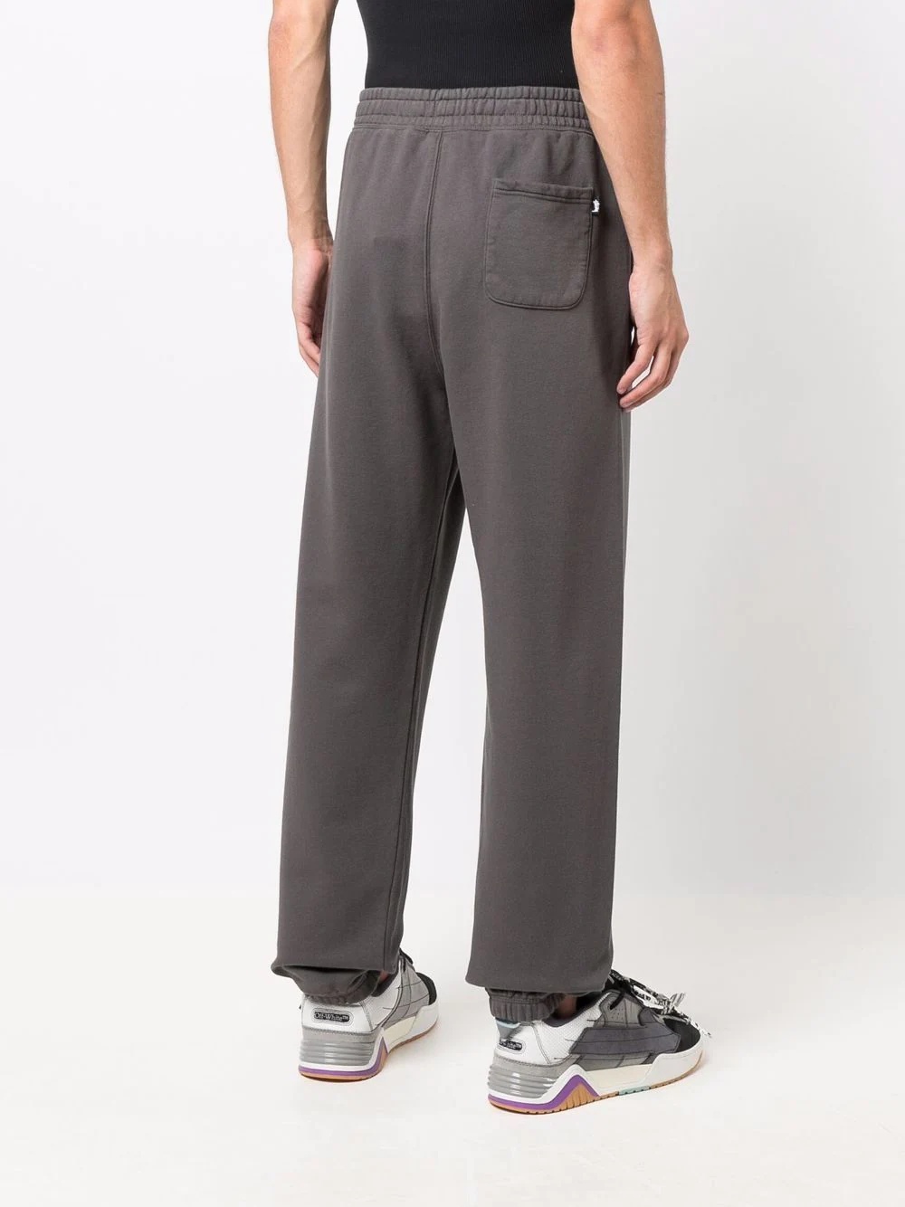 Smooth Stock logo-print trousers - 4