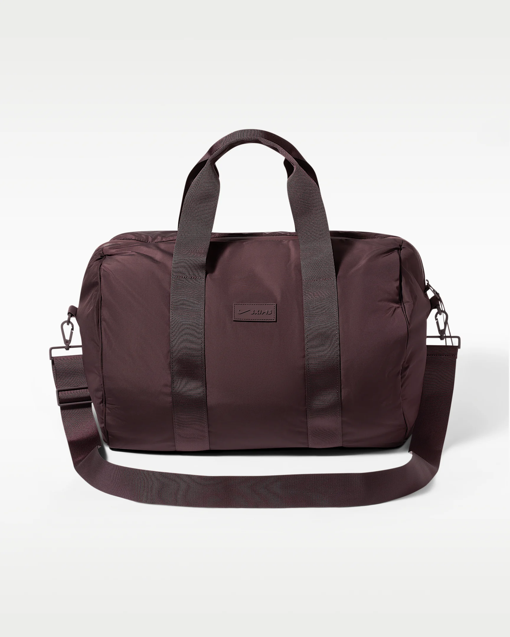 NikeSKIMS Women's Puffer Gym Bag - 1