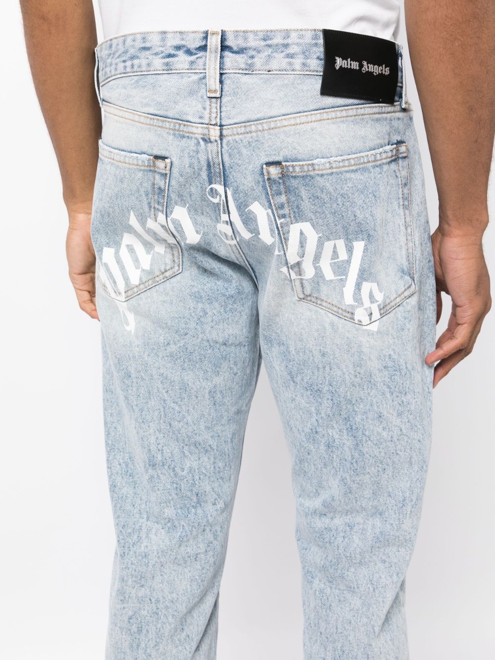 curved-logo print jeans - 5