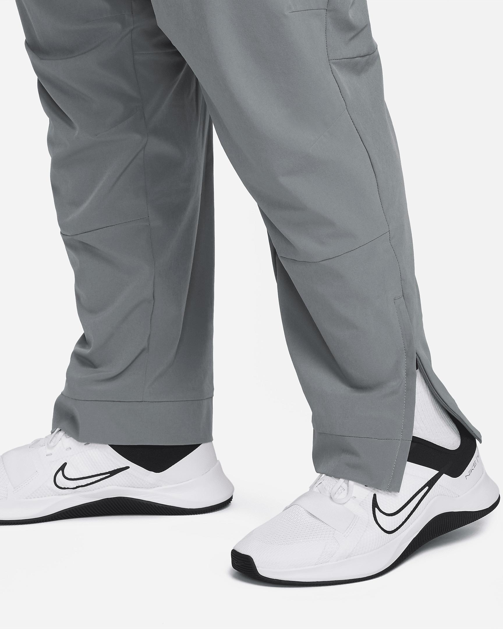 Nike Unlimited Men's Dri-FIT Zippered Cuff Versatile Pants - 10