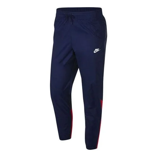 남자 나이키 로고 자수 대조 색깔에 의하여 길쌈된 뭉치 발 스포츠 바지/Trousers/Joggers 파란 - 1