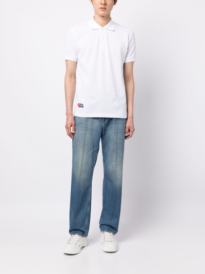 Comme des Garçons PLAY logo-appliqué cotton polo shirt outlook