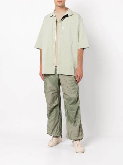 Engineered Garments straight-leg leaf-print trousers outlook