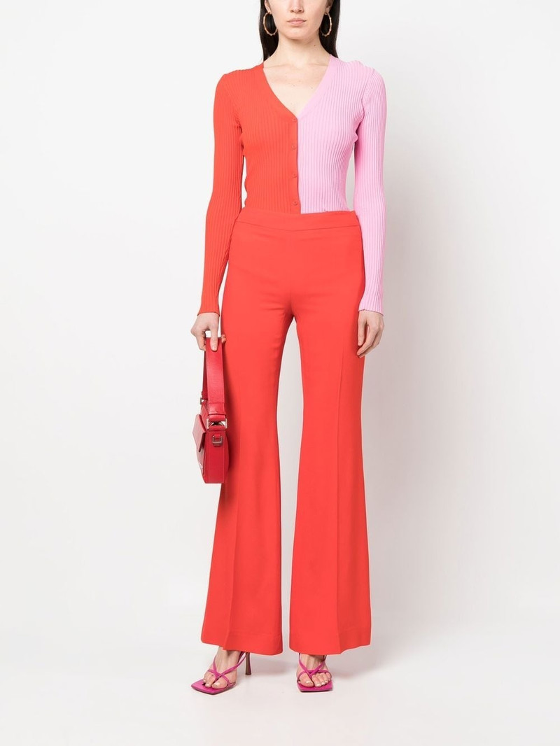 Moschino pressed-crease flared trousers outlook