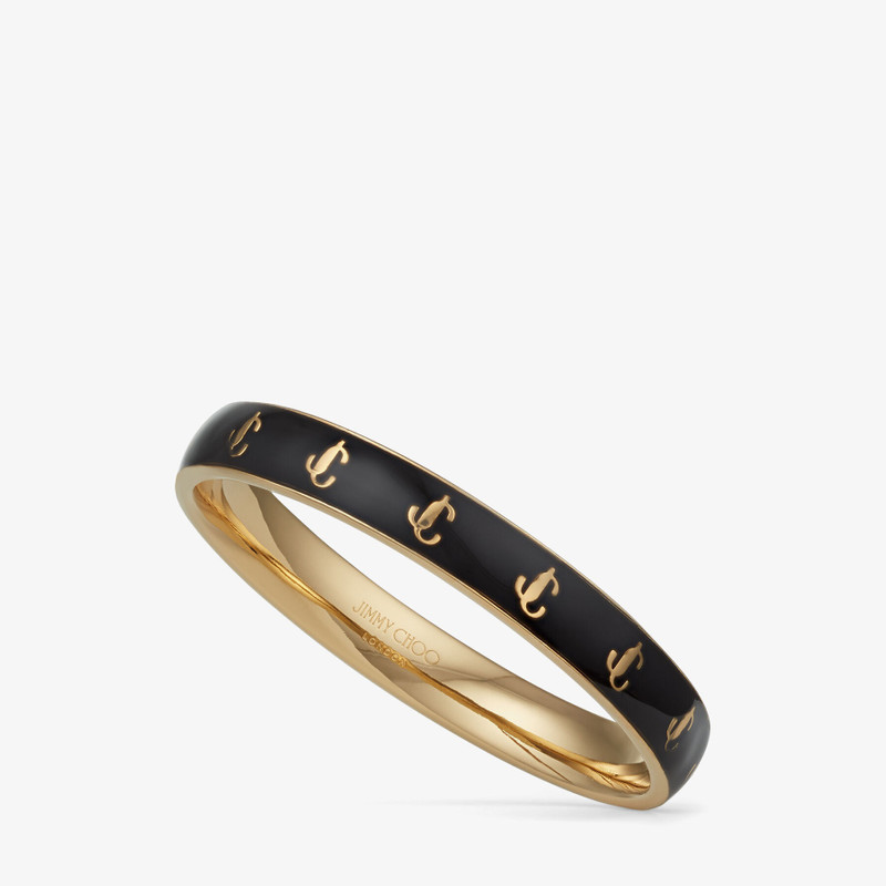 JC Enamel Bangle
Gold-Finish Metal and Black Enamel JC Bangle 4