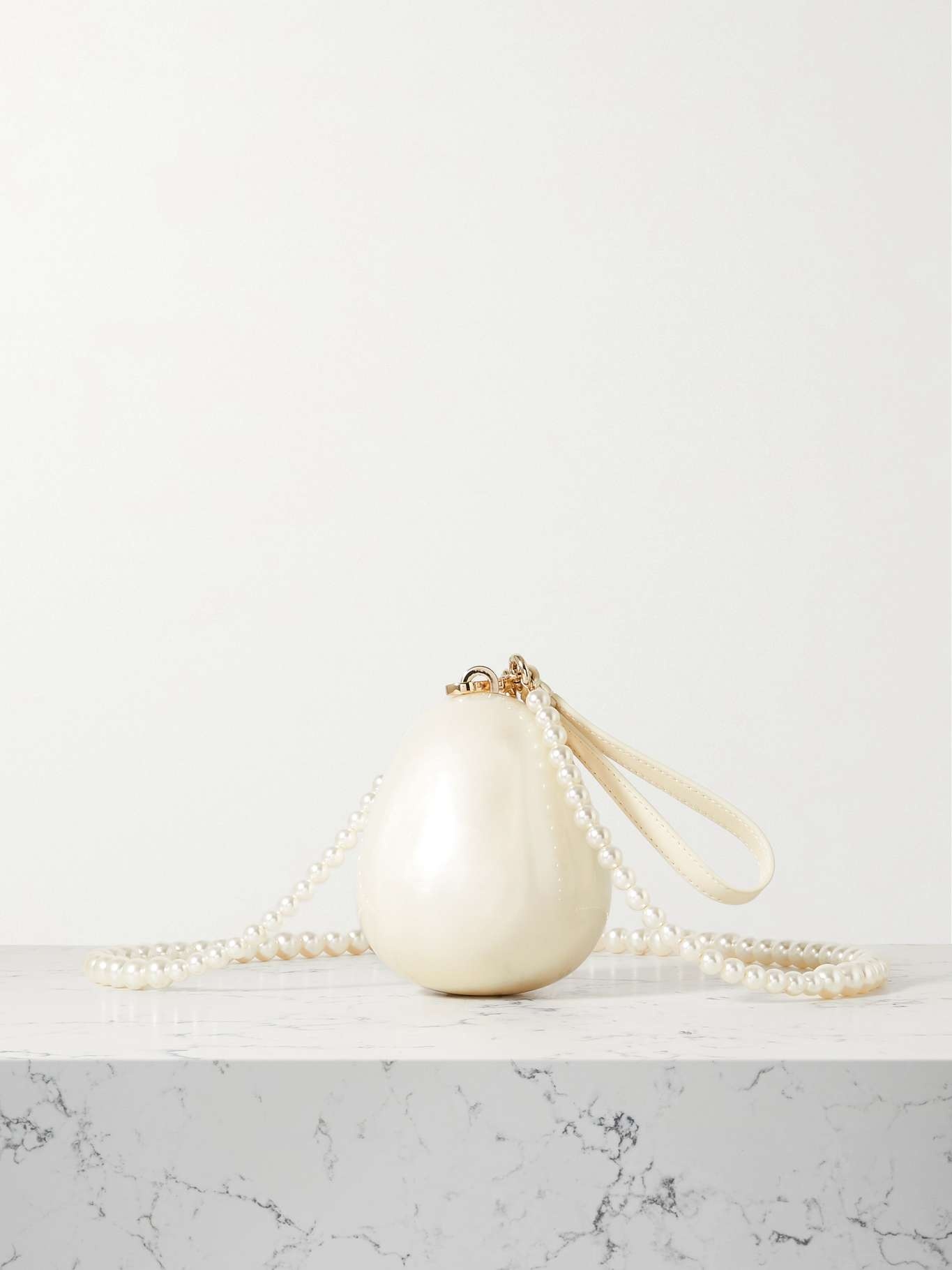 Micro Egg faux pearl-embellished acrylic clutch - 1