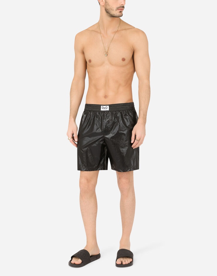 Laminated mid-length swim trunks with D&G patch - 2