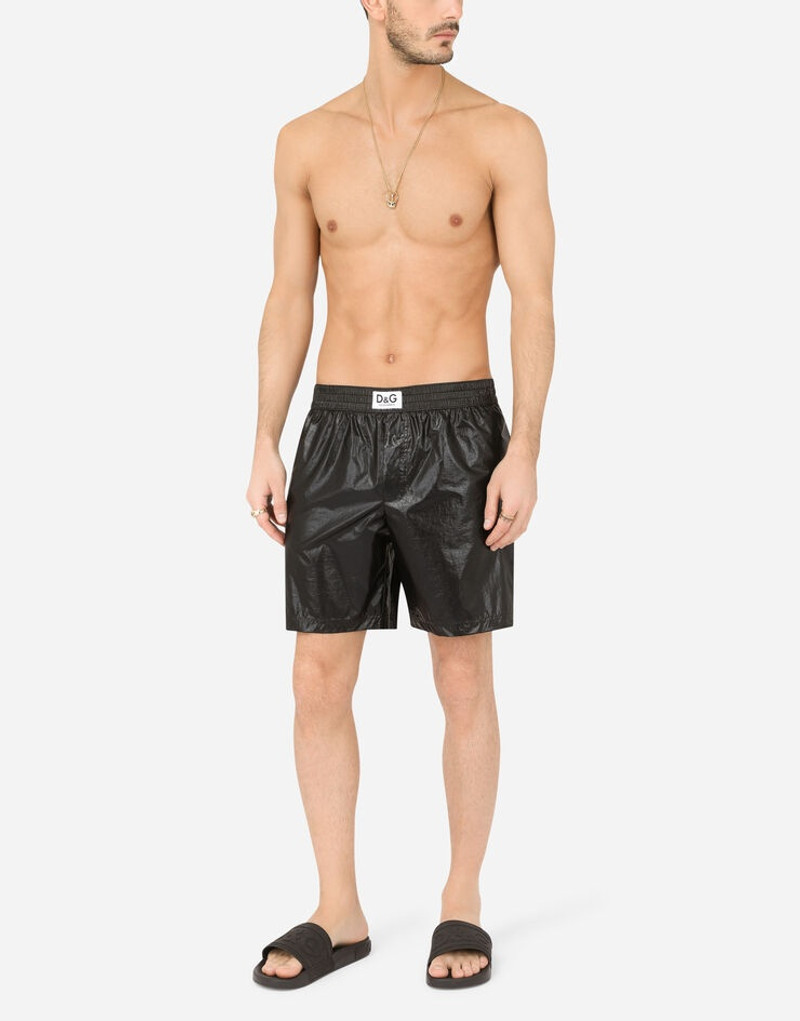 Laminated mid-length swim trunks with D&G patch 3