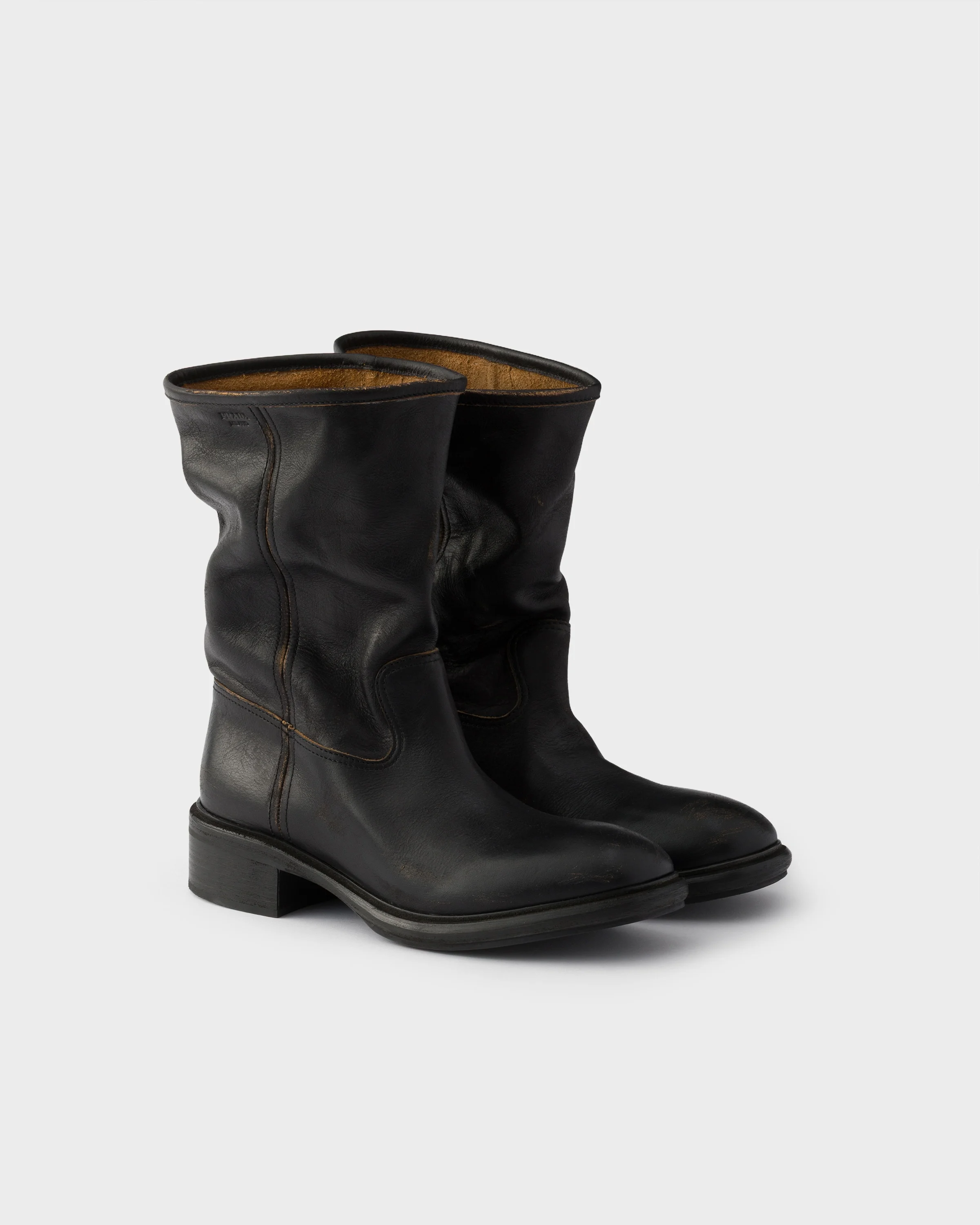 Vintage-effect leather boots - 1