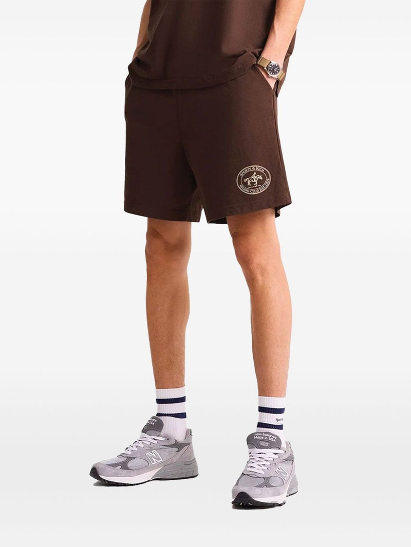 Sporty & Rich Riding Club track shorts outlook