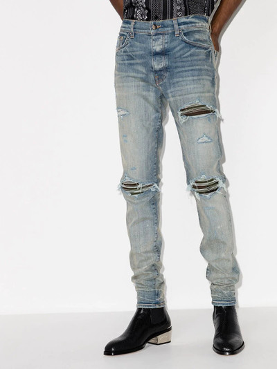 AMIRI ripped distressed skinny jeans outlook