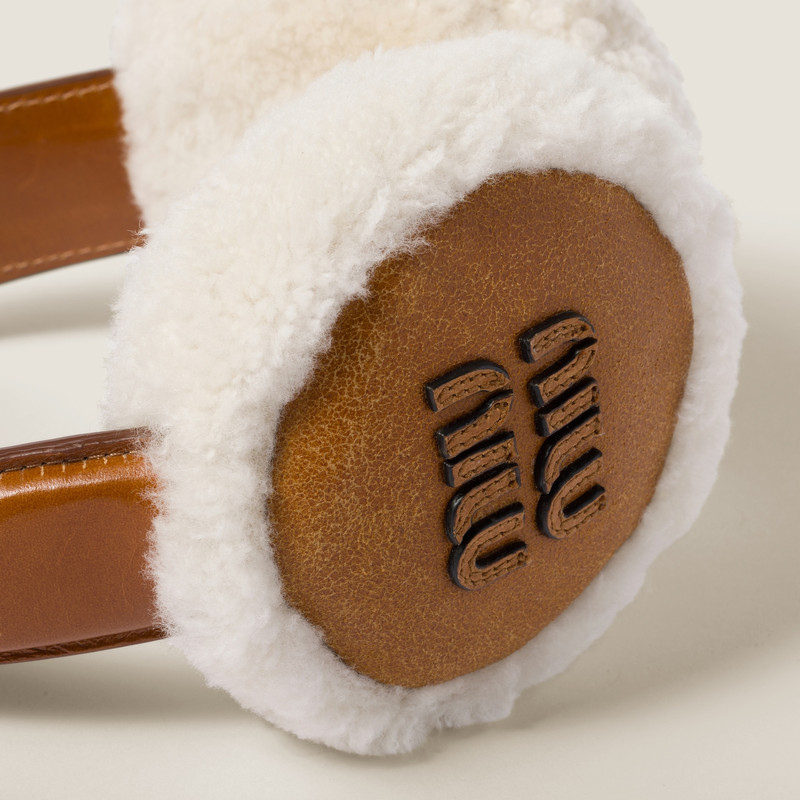Miu Miu Shearling earmuffs outlook