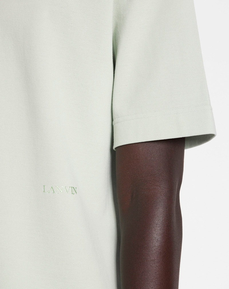 OVERSIZED POLO WITH CURB LACE DETAILS 5