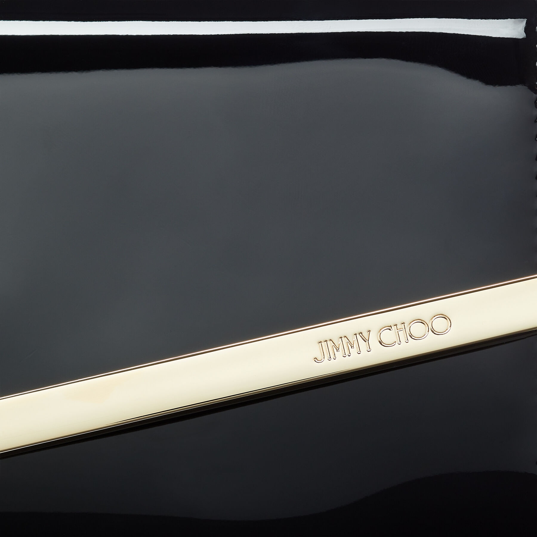 Emmie
Black Patent Leather Clutch Bag - 3