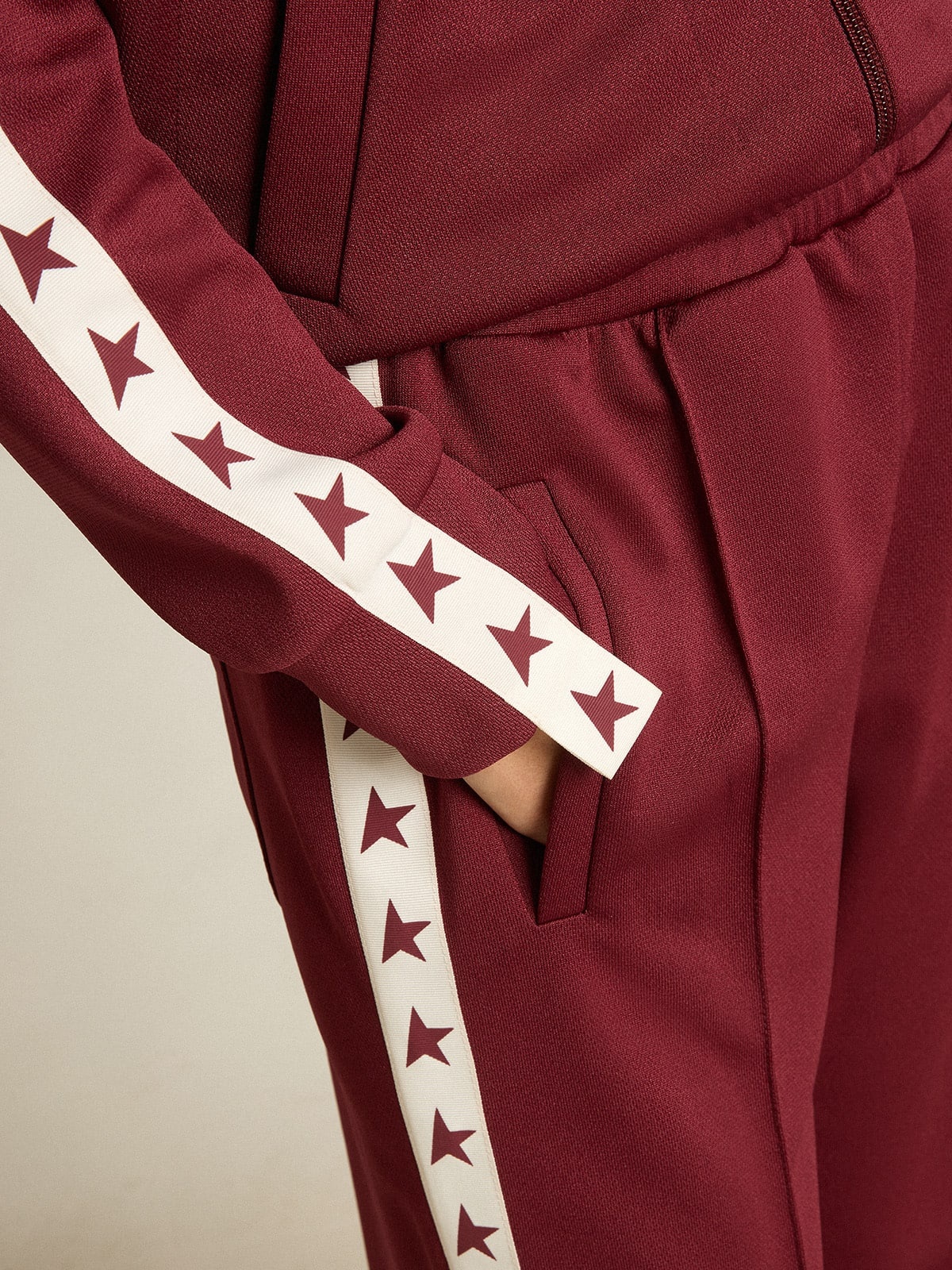 Women’s burgundy zipped sweatshirt with white strip and contrasting stars - 5